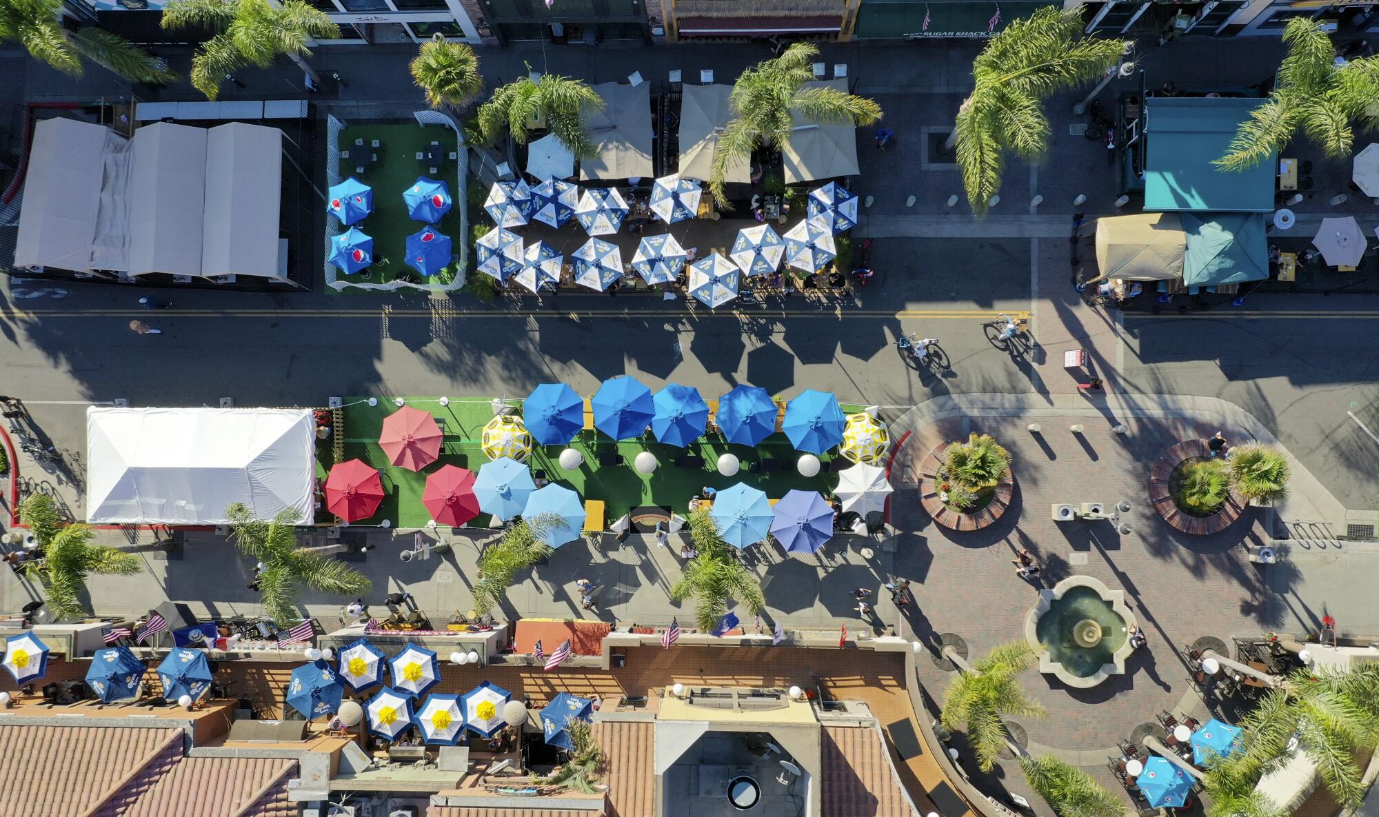 An aerial view of outdoor dining as restaurants moved onto Main Street in Huntington Beach. 