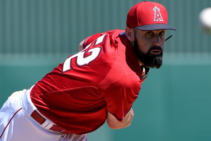 Angels starter Matt Shoemaker delivers a pitch against the Padres during an exhibition game on Friday in Tempe, Ariz.