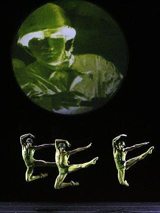 Alberta Ballet is visiting Southern California with its production of "Joni Mitchell's The Fiddle and the Drum," built of Mitchell songs and named after the singer-songwriter's 1969 song about war and peace. Here, Blair Puente, Kelley McKinlay and Travis Walker perform in the segment set to the song "The Beat of Black Wings."