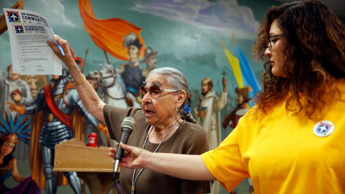 Margaret Cisneros speaks at the community meeting. Physicians label warehouse areas diesel death zones because of the cancer and asthma risks from trucks and trains carrying goods from the ports.