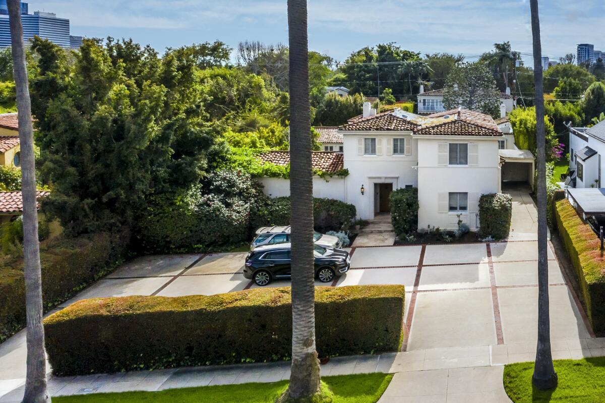 The Italianate-style house on North Bedford Drive received 18 offers within the first 24 hours of being on sale in March.