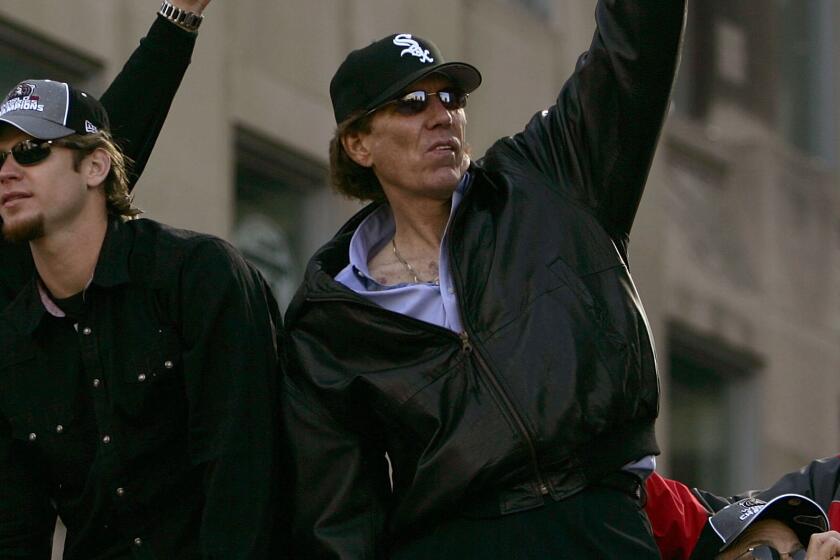 CHICAGO - OCTOBER 28: (L-R) Aaron Rowand, Geoff Blum, Joe Crede and announcer Ed Farmer of the Chicago White Sox wave to the crowd at the White Sox victory parade and rally on October 28, 2005 in Chicago, Illinois. The Chicago White Sox won their first World Series in 88 years after beating the Houston Astros in a four-game sweep. (Photo by Jonathan Daniel/Getty Images)