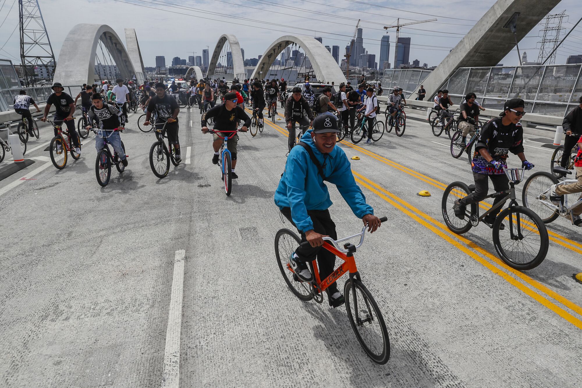 Members of Goon Ride gather midspan on the 6th Street Viaduct causing police to shut the bridge down. 