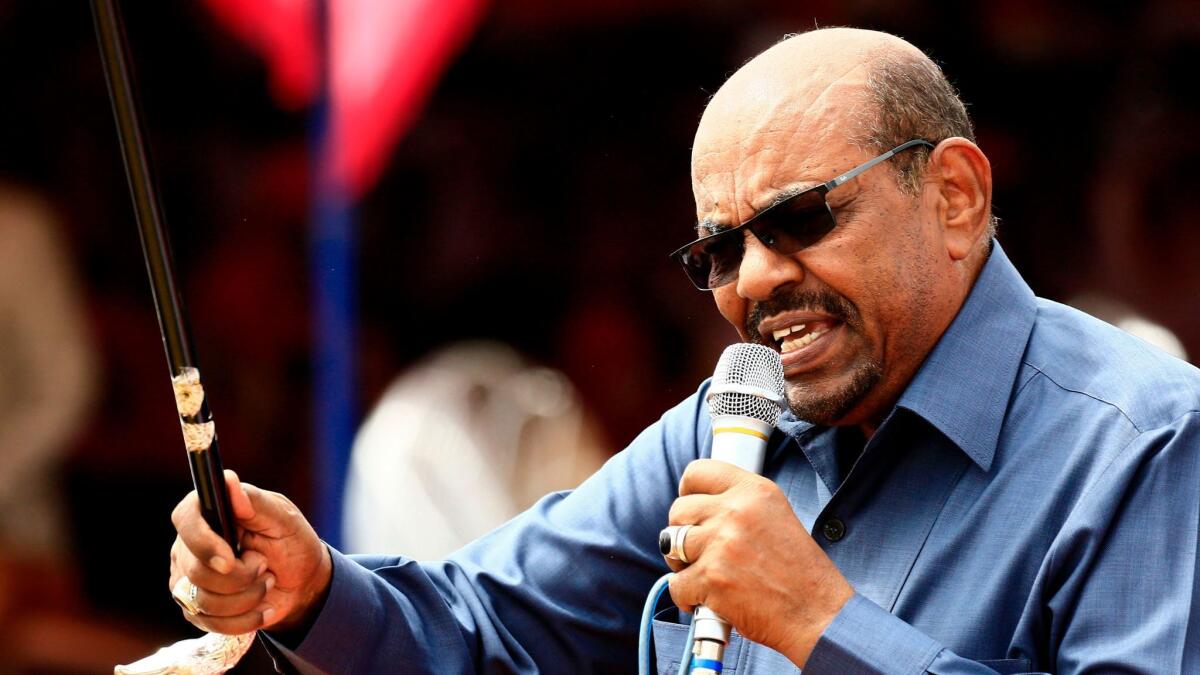 Sudanese President Omar Hassan Ahmed Bashir delivers a speech during a visit to the village of Bilel in South Darfur, near the Kalma camp for displaced people, on Sept. 22, 2017.