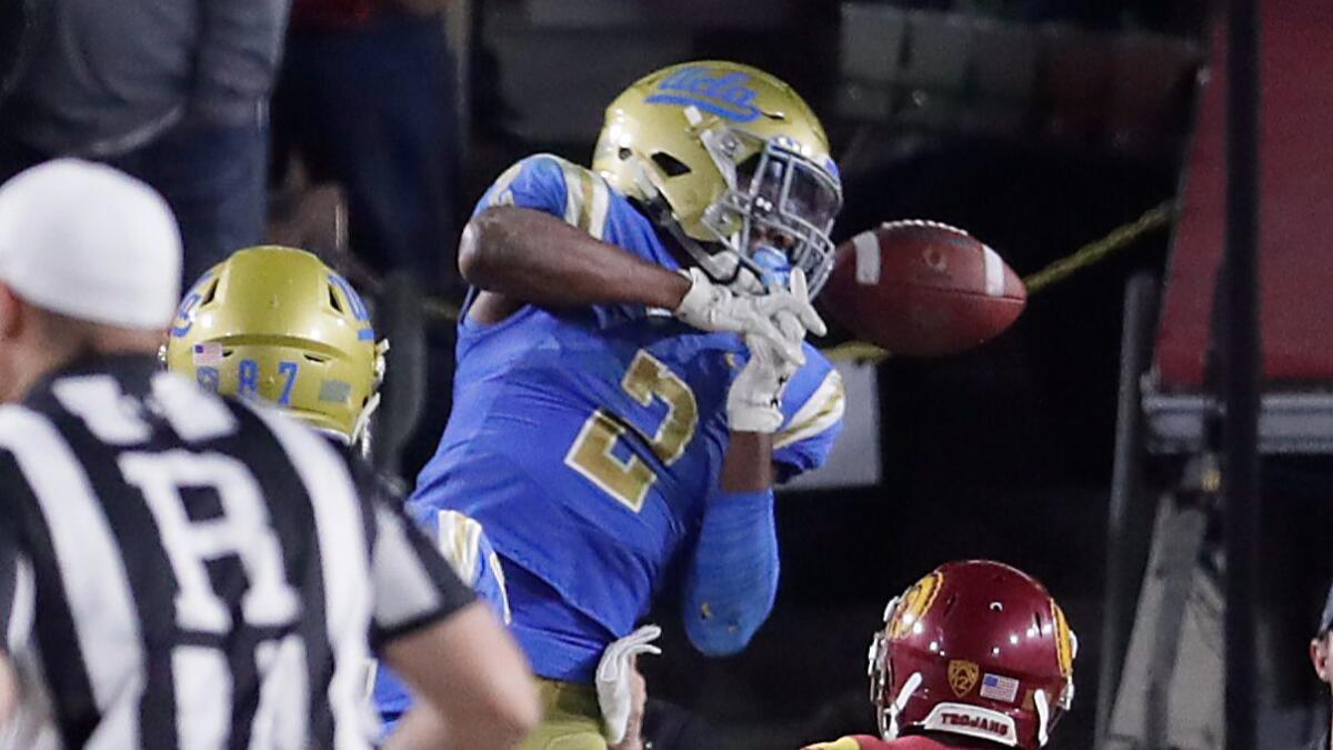 UCLA receiver Jordan Lasley misses a Josh Rosen pass on a two-point conversion attempt late in the fourth quarter of a loss Saturday to USC at the Coliseum.
