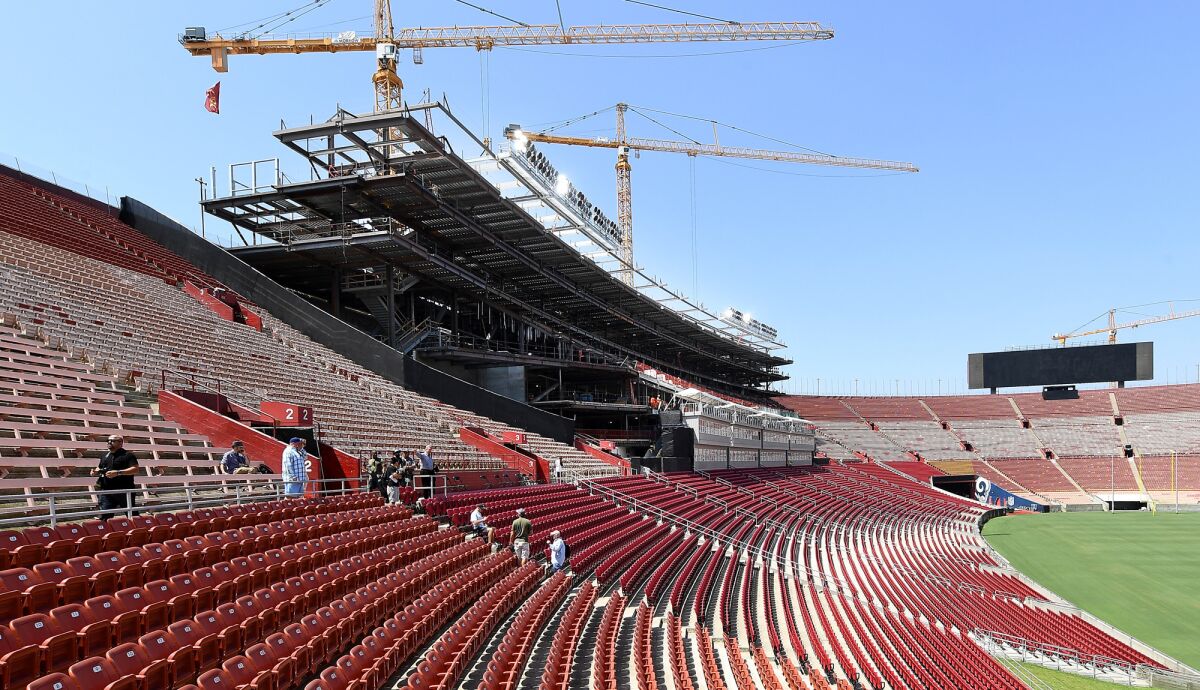 A view of the new seats as construction continues on the new suites, owner boxes and press box at the Coliseum.