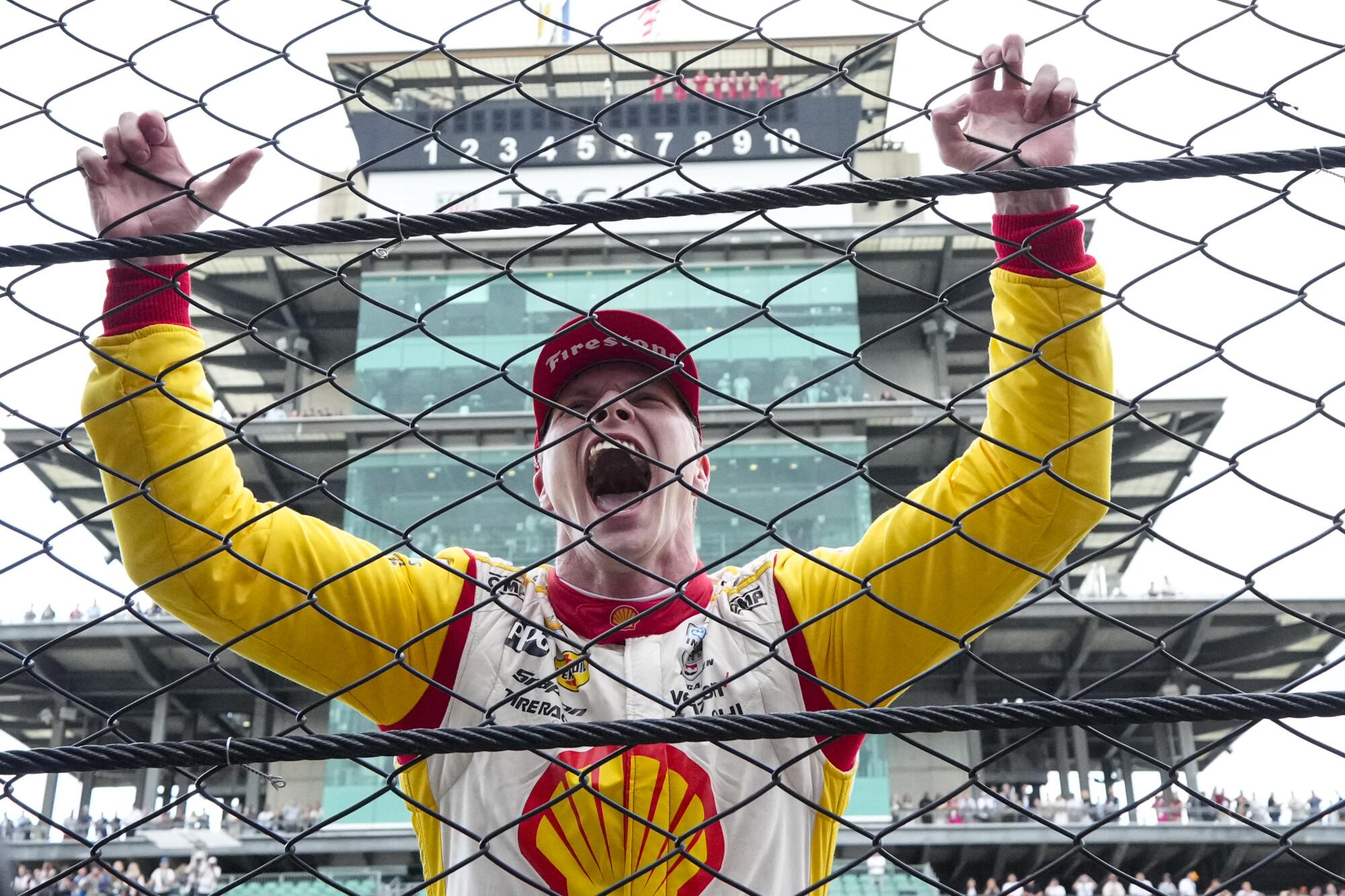 Josef Newgarden celebrates after winning the Indianapolis 500 at the Indianapolis Motor Speedway on Sunday.