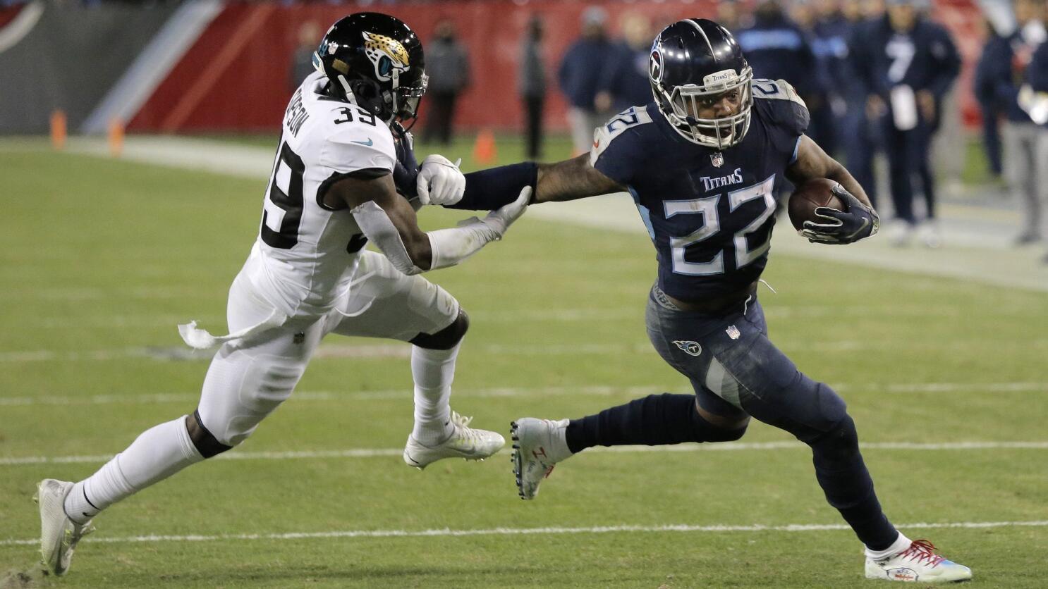 Derrick Henry runs into NFL record book as Titans rout Jaguars 30-9 – The  Denver Post