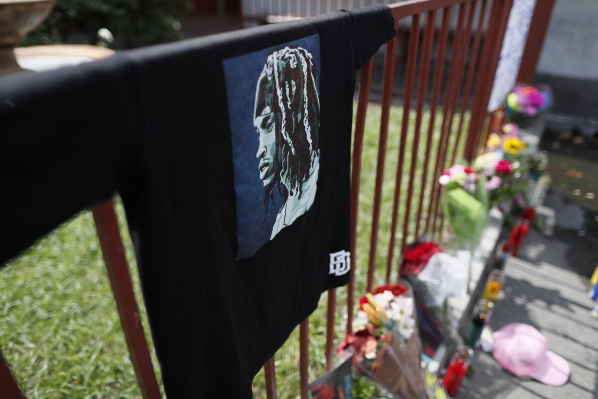 A makeshift memorial was in the parking lot at Roscoe's House of Chicken & Waffles where rapper PnB Rock was shot and killed.