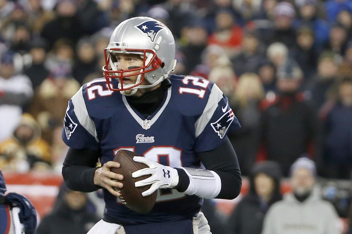 New England Patriots quarterback Tom Brady rolls out to pass during a divisional playoff game against the Baltimore Ravens on Jan. 10.