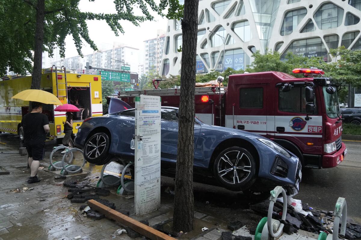 Car damaged by flooding in Seoul