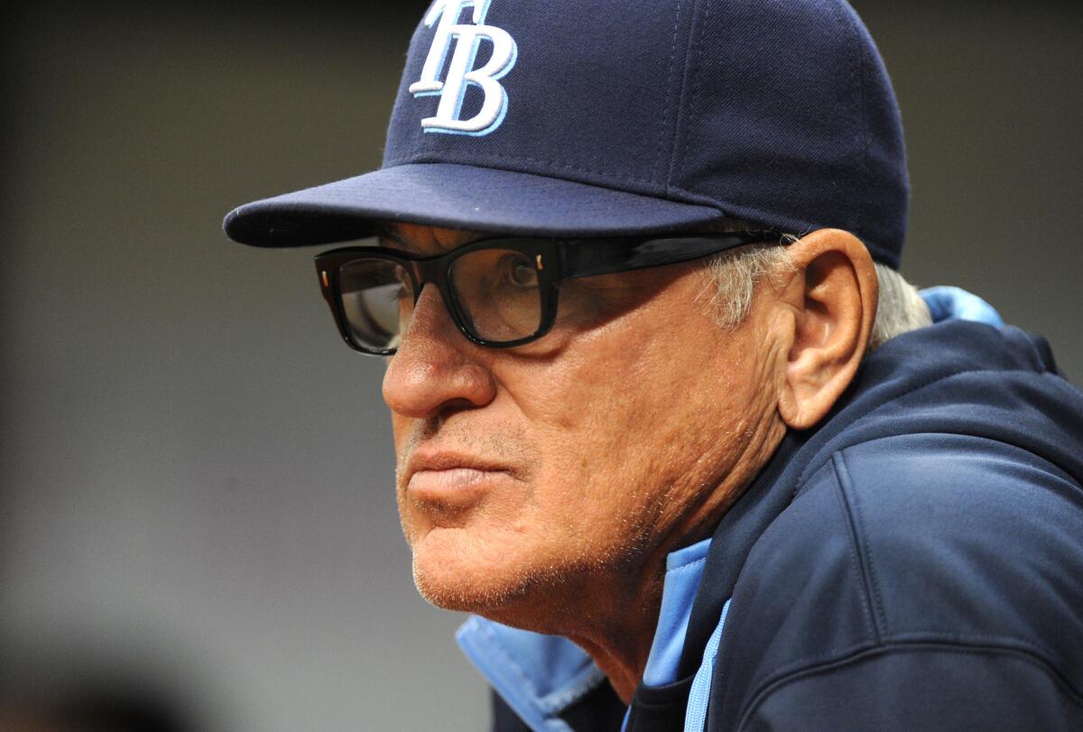 Tampa Bay Manager Joe Maddon watches from the dugout as the Rays play the Baltimore Orioles on Sept. 5.