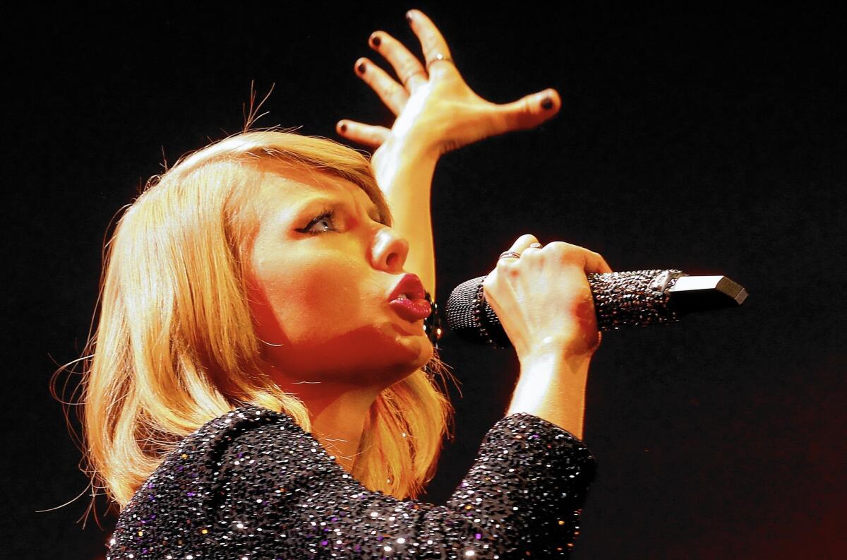 Taylor Swift made a loud splash in announcing her move from country to pop with new album “1989.”