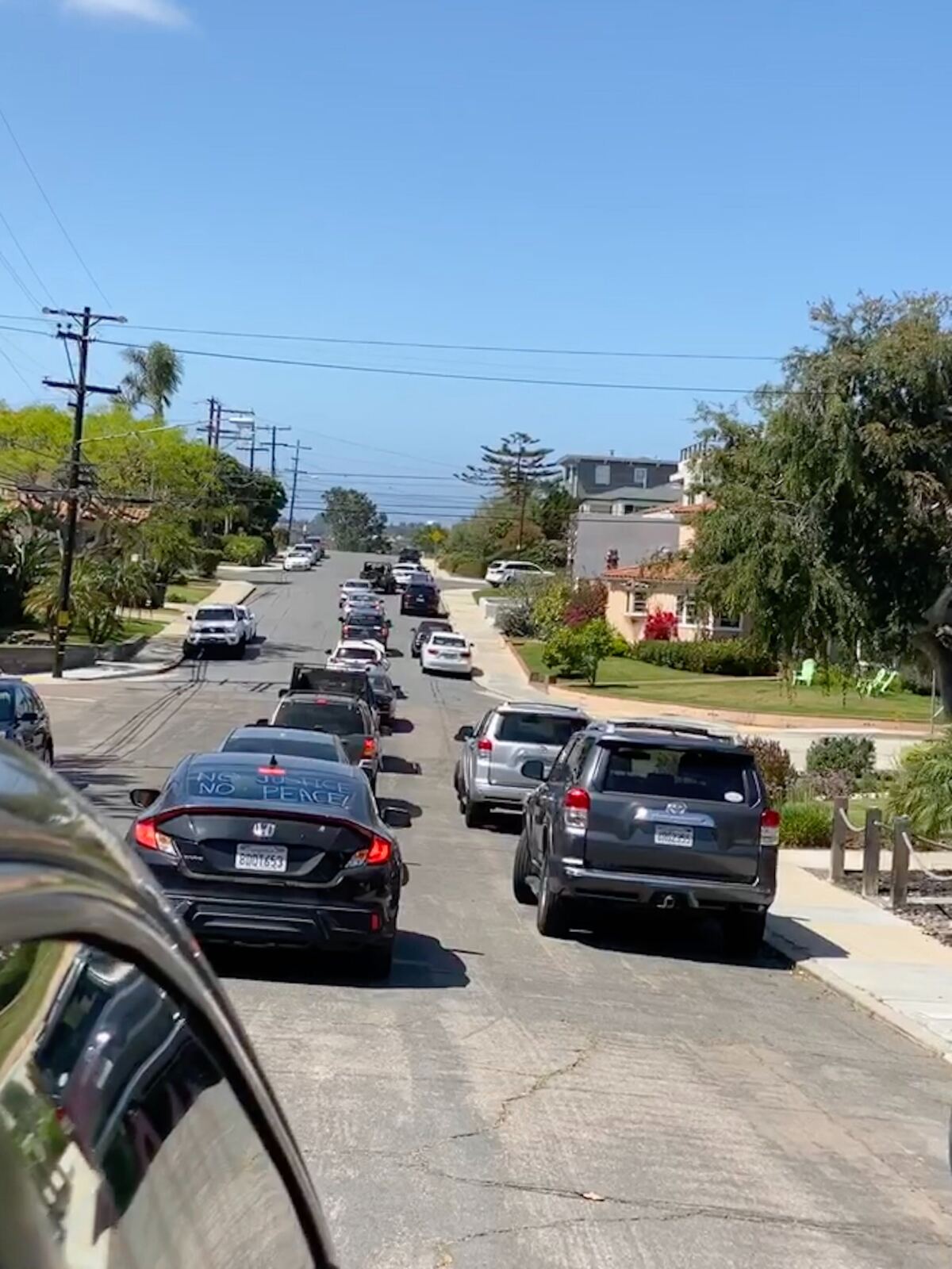Advocates held an in-car rally in Point Loma on Friday to protest San Diego Mayor Kevin Faucloner's proposed budget for fiscal year 2021.