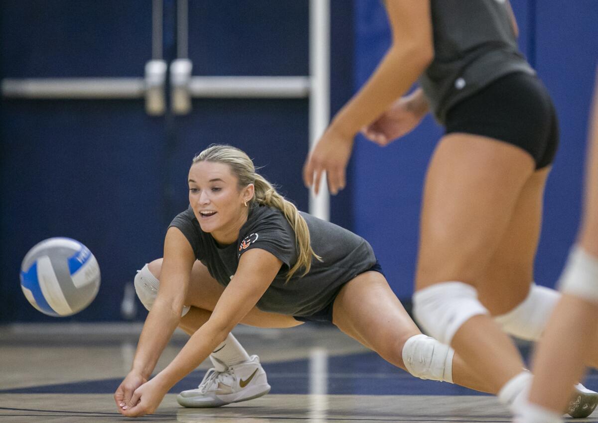 Newport Harbor's Laine Briggs digs a ball during the Orange County All-Star girls' volleyball match on Tuesday.