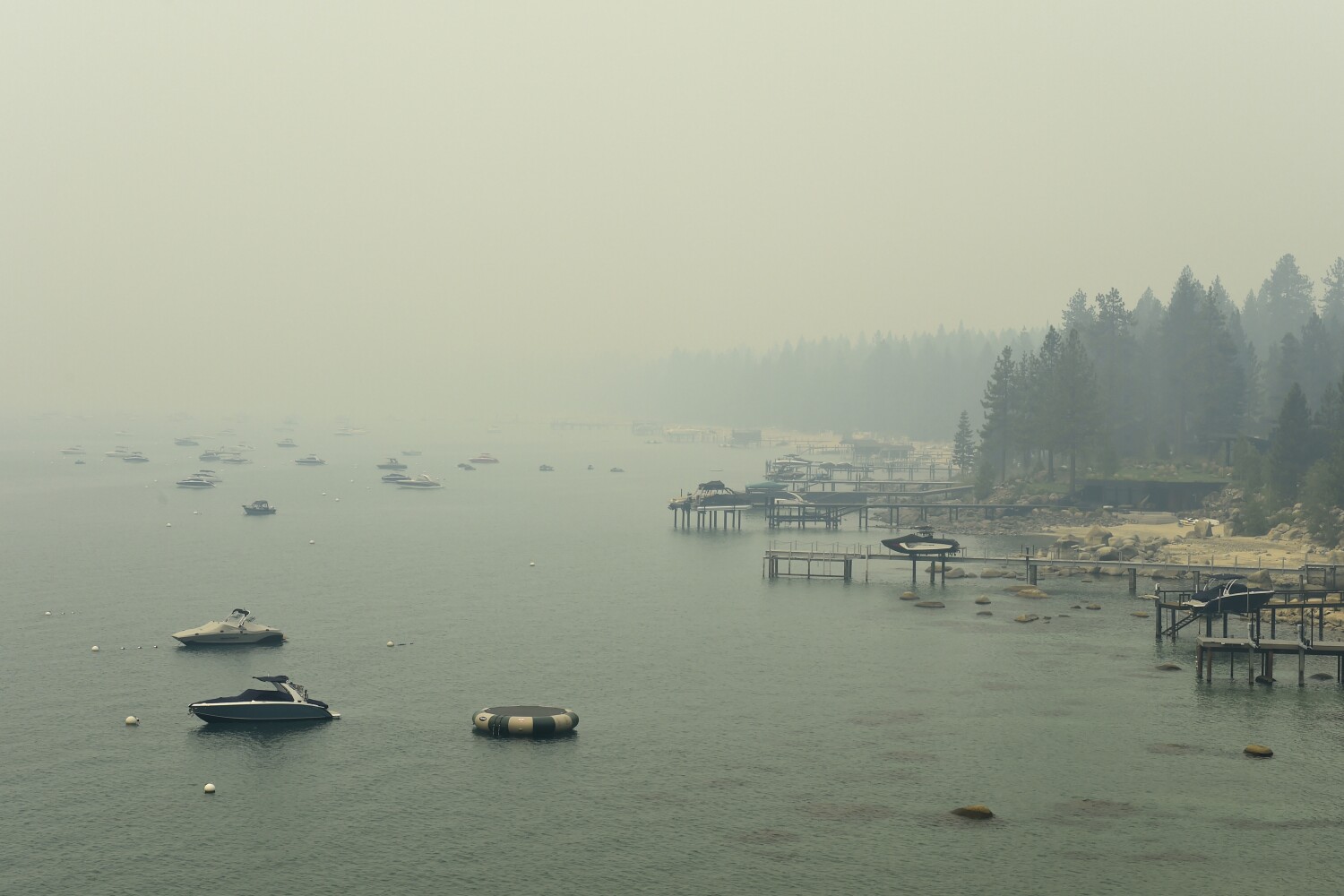 Lake Tahoe resort an eerie ghost town covered by smoke as Caldor fire burns closer