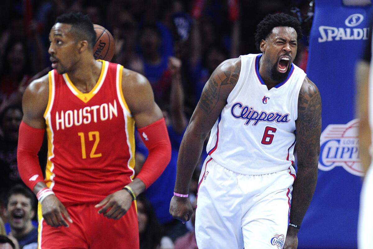 Dwight Howard (12) and DeAndre Jordan (6) share several things in common, one being each spurned overtures to join the Dallas Mavericks.