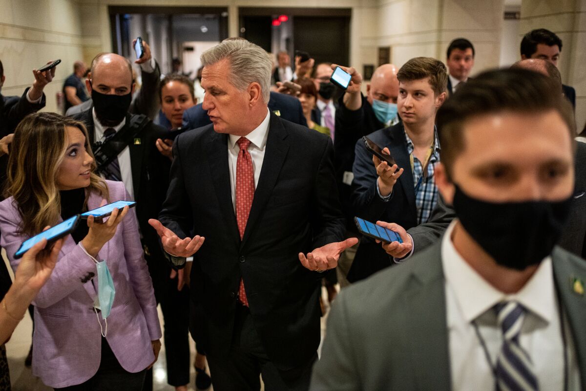 House Minority Leader Kevin McCarthy speaks with reporters at the U.S. Capitol on May 14. 
