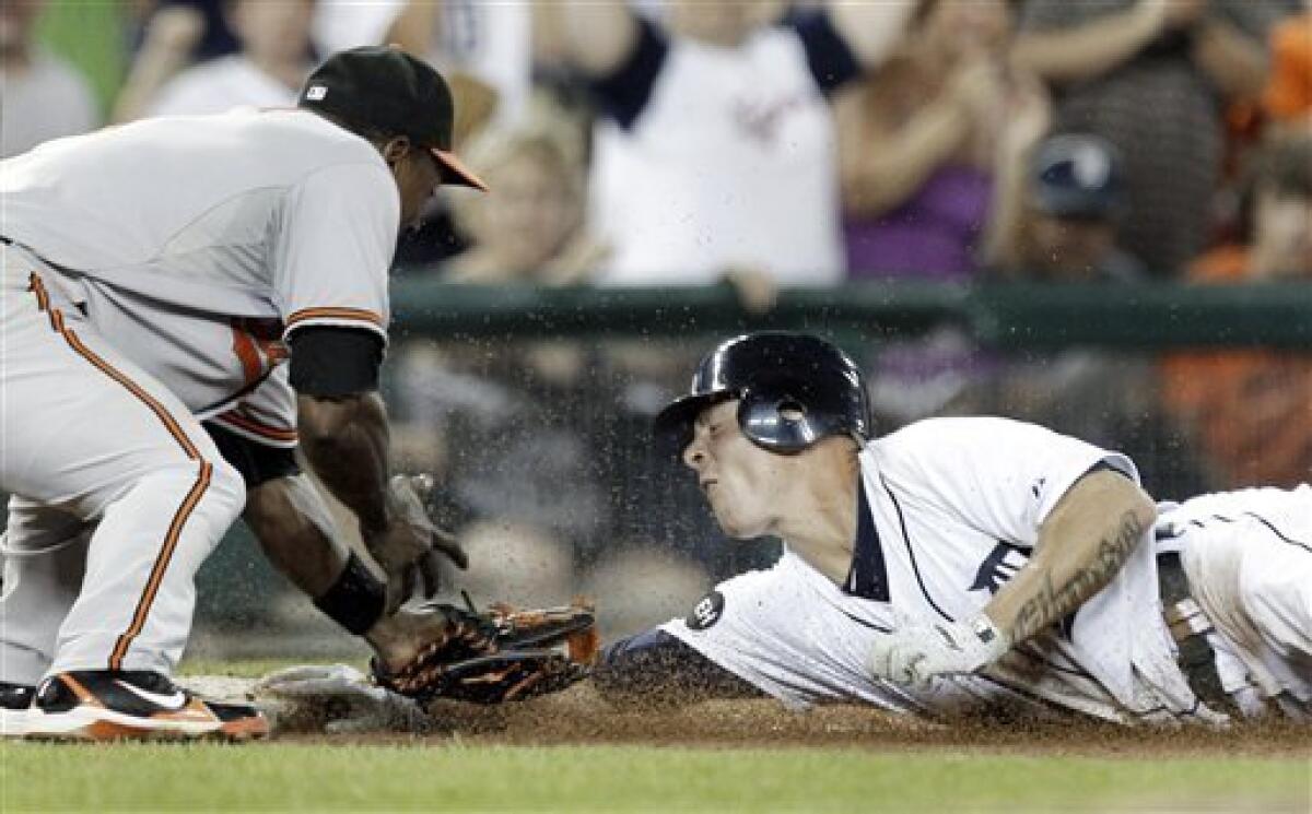 Detroit Tigers' Johnny Damon hits a two-run home run in the 11th