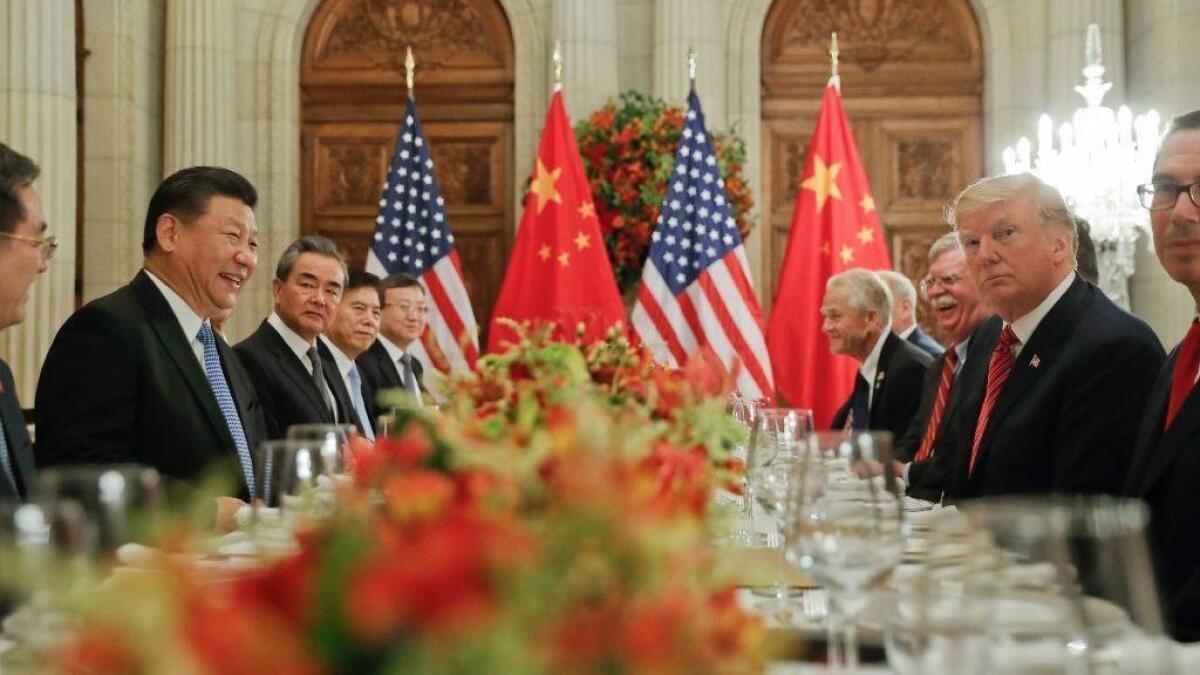 President Trump dines with Chinese President Xi Jinping during last month's G-20 summit in Buenos Aires.
