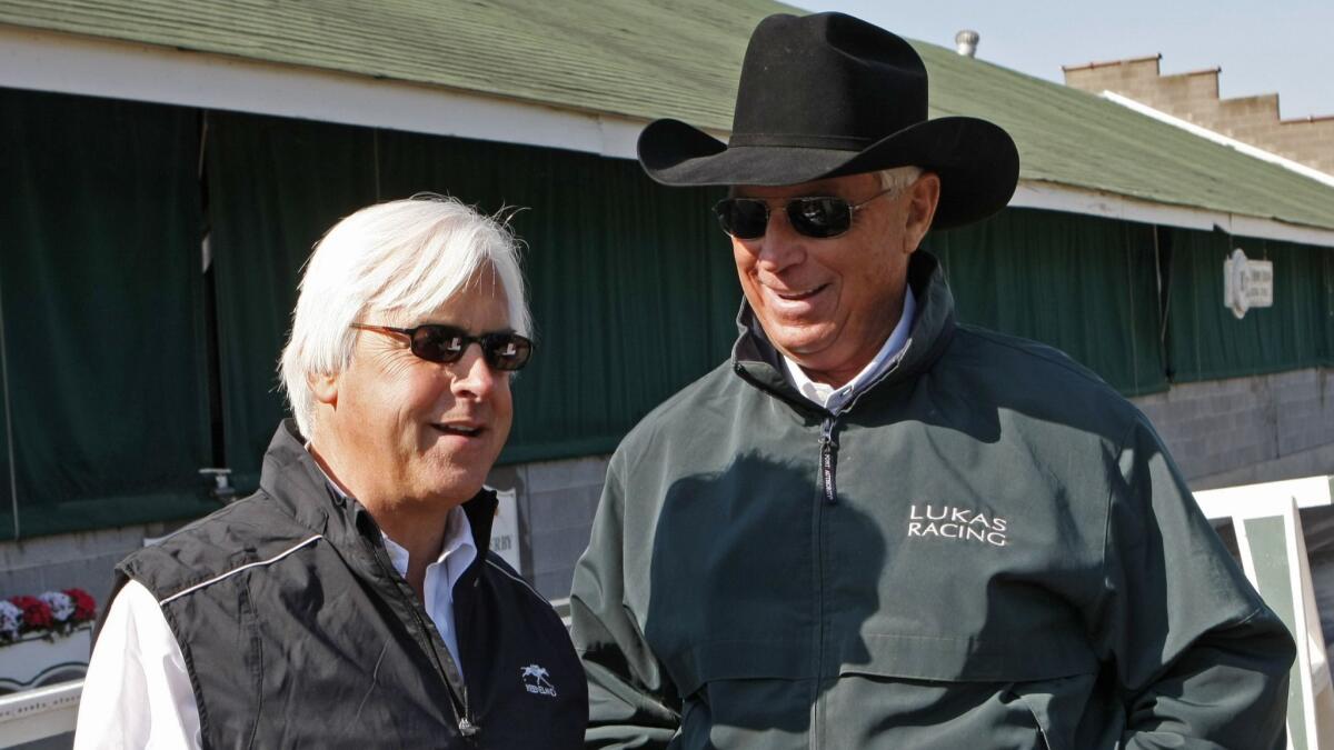 Trainers Bob Baffert, left, and Wayne Lukas, shown in 2010, have won the Preakness Stakes six times each.