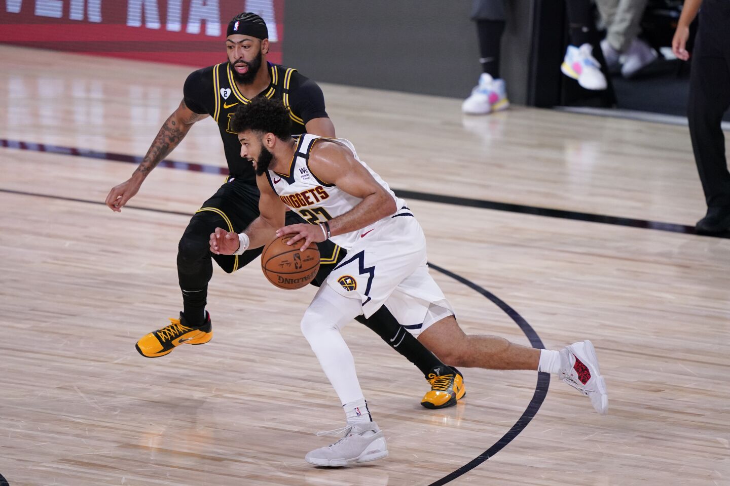 Nuggets guard Jamal Murray drives against Lakers forward Anthony Davis during Game 2.