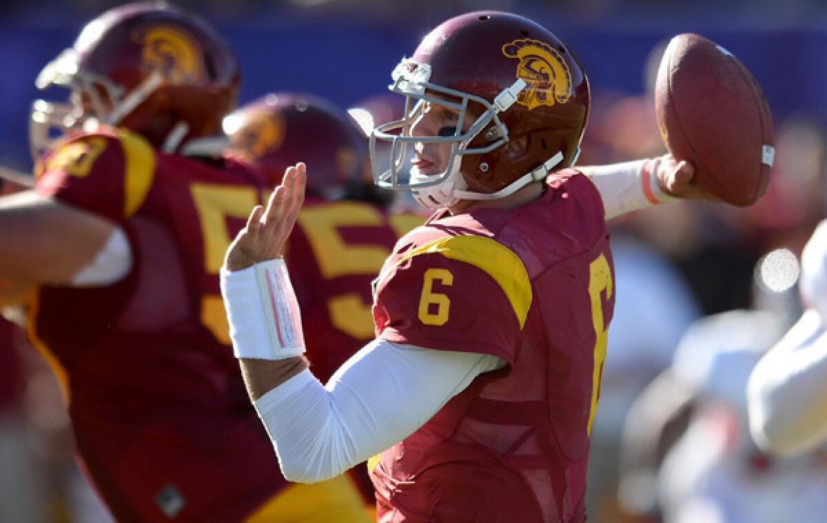 USC quarterback Cody Kessler throws a pass during the Trojans' win over Fresno State in the Las Vegas Bowl last month. USC will play the Bulldogs again in its 2014 season opener.