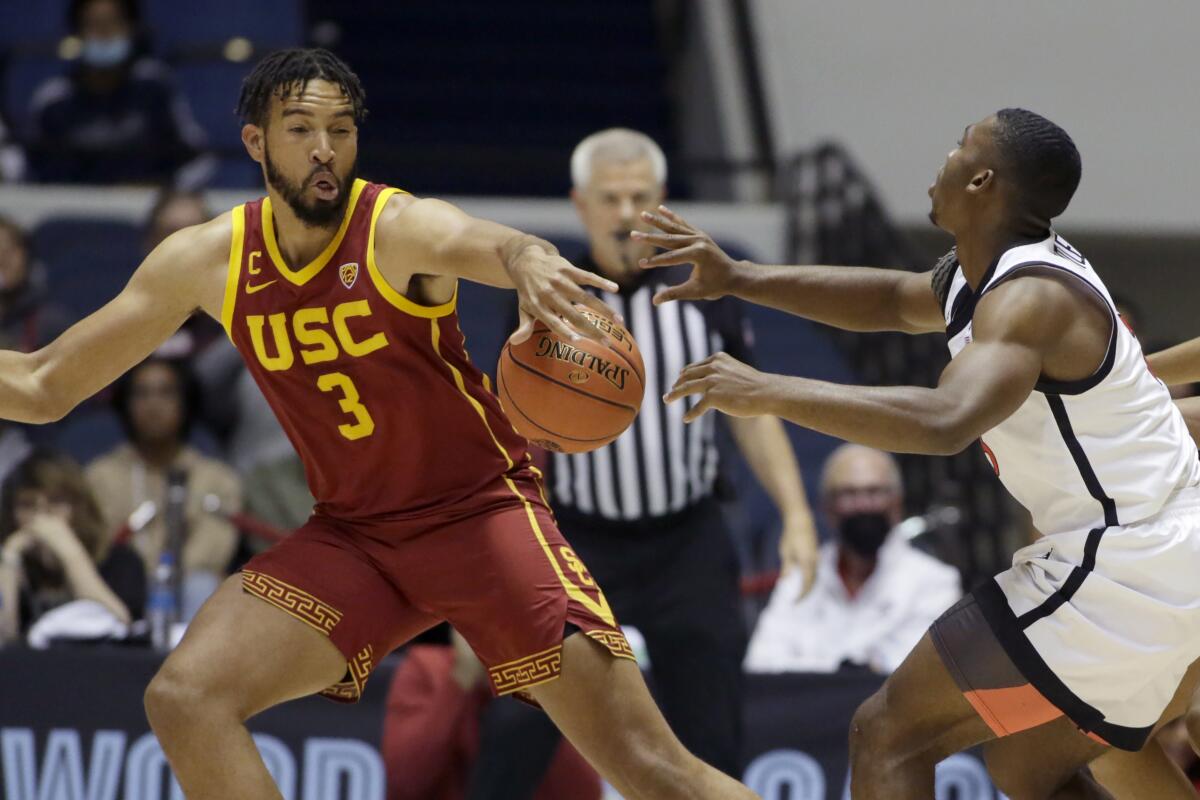 USC forward Isaiah Mobley steals a pass by San Diego State guard Lamont Butler.