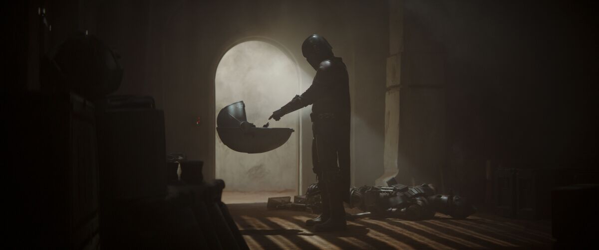 Mando and the Child in 'The Mandalorian'