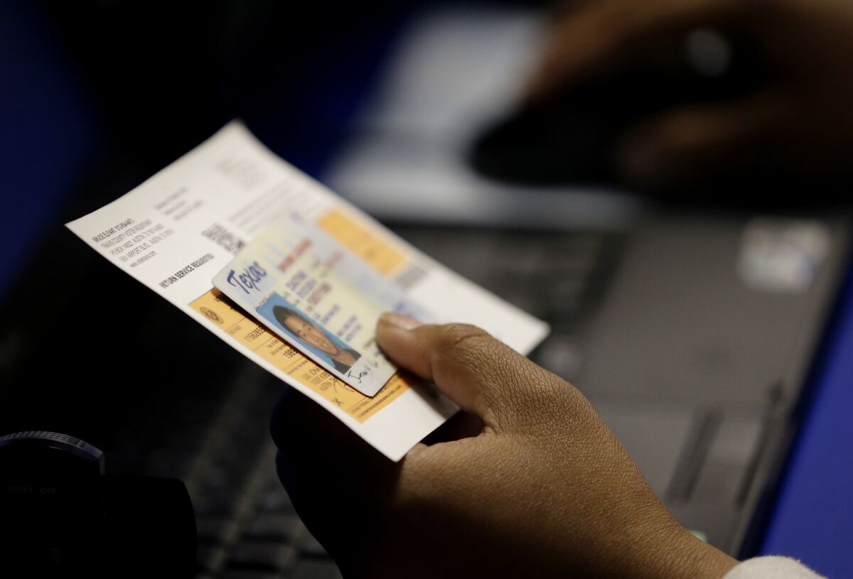 A majority of the nation's highest court rejected an emergency request from the Justice Department and civil rights groups to prohibit Texas from requiring voters to produce certain forms of photo identification in order to cast ballots.