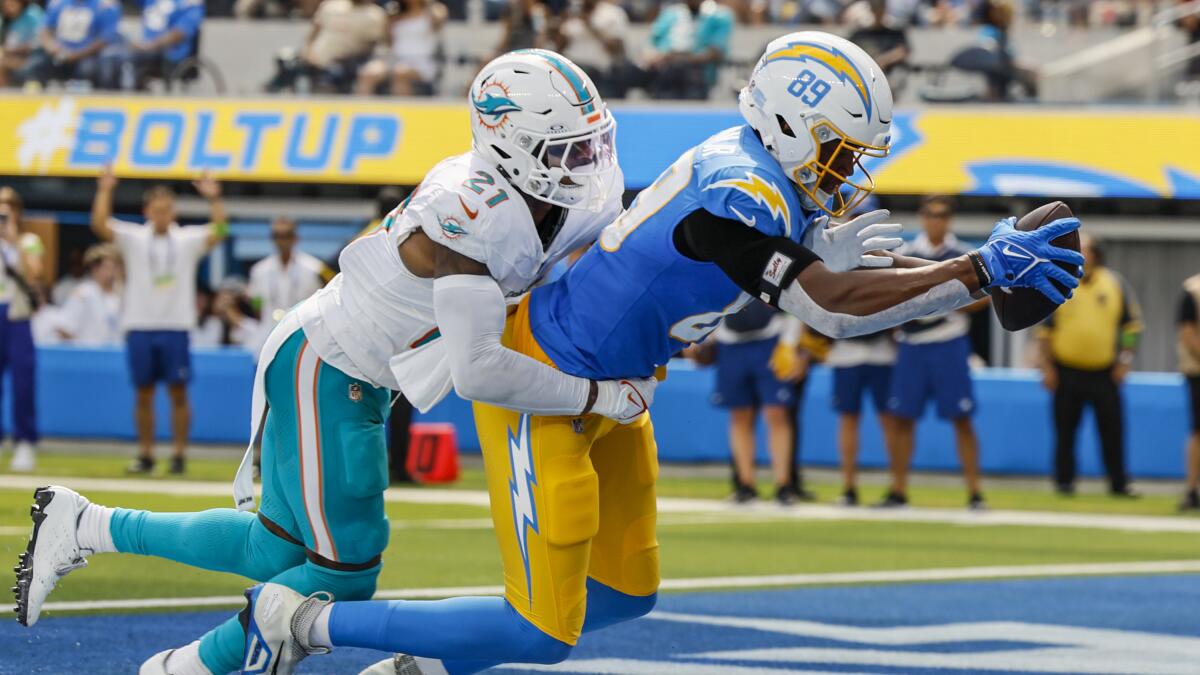 Hill helps Dolphins find end zone, but Chargers win