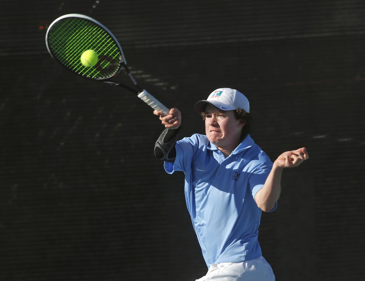 CdM's Jack Cross runs down a forehand ball at the 22nd annual National High School Tennis All-American Tournament Friday.
