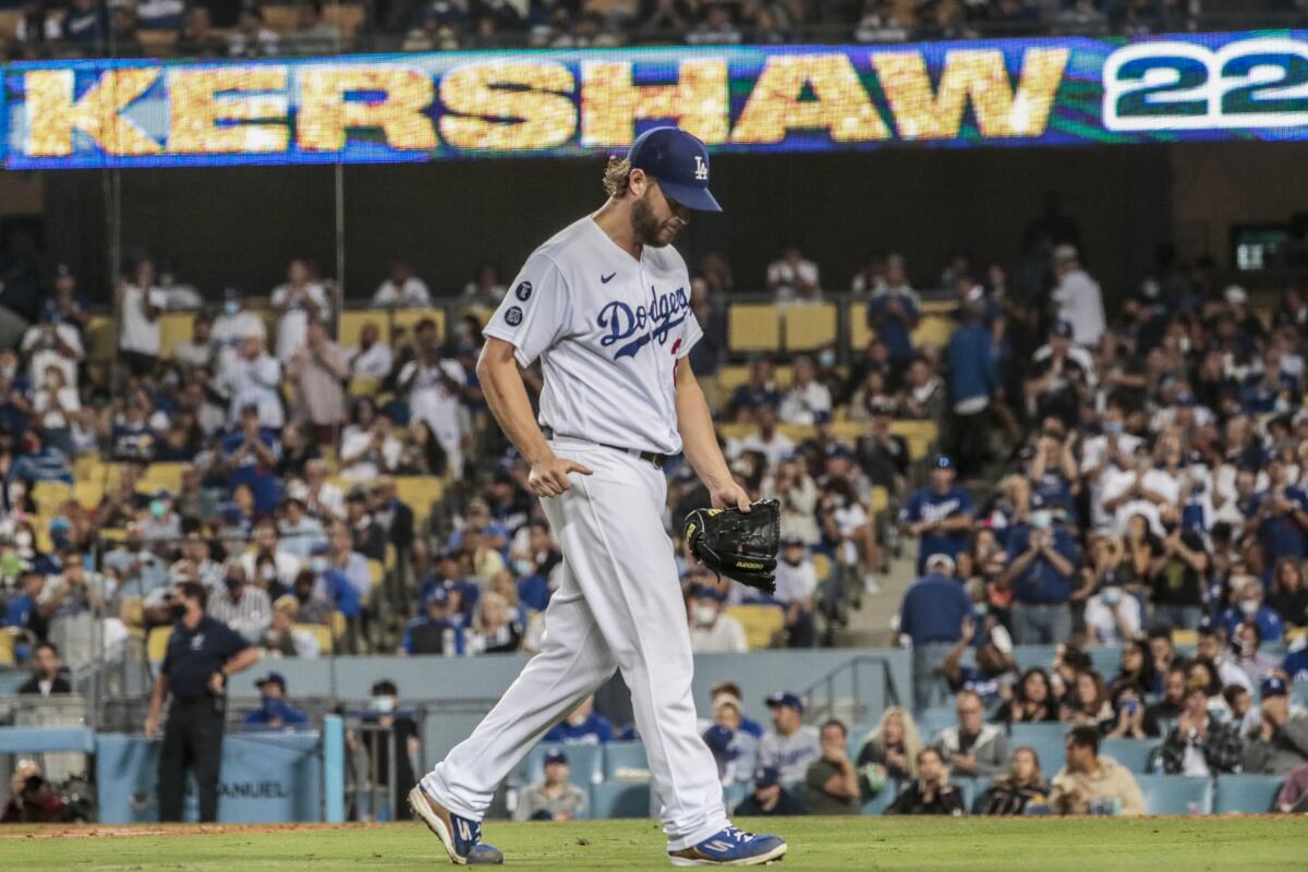 Los Angeles, CA, Monday, Sept. 13, 2021 - Los Angeles Dodgers pitcher Clayton Kershaw heads to the dugout.