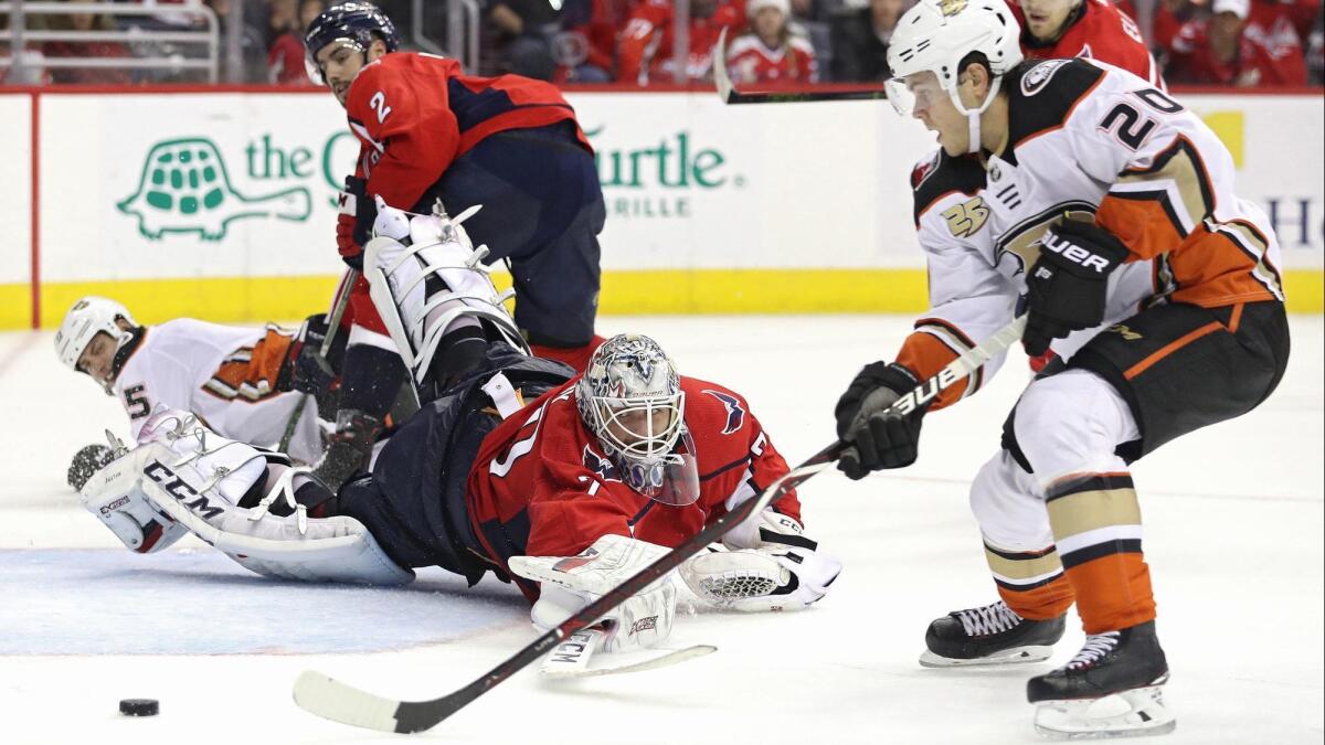 Ducks' Pontus Aberg (20) scores the game-winning goal on Capitals goalie Braden Holtby (70) on Dec. 2.