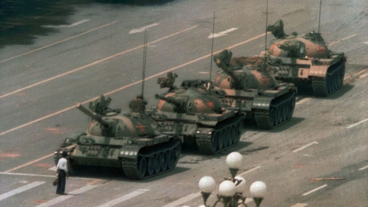 A Chinese man blocks tanks leaving Tiananmen Square on June 5, 1989, the day after the fatal crackdown, capturing the world's imagination.