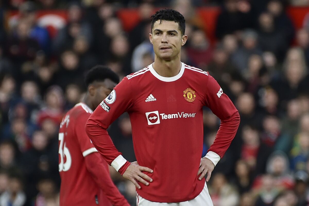 Manchester United's Cristiano Ronaldo reacts during the English Premier League soccer match between Manchester United and Watford at Old Trafford in Manchester, England, Saturday, Feb. 26, 2022. (AP Photo/Rui Vieira)