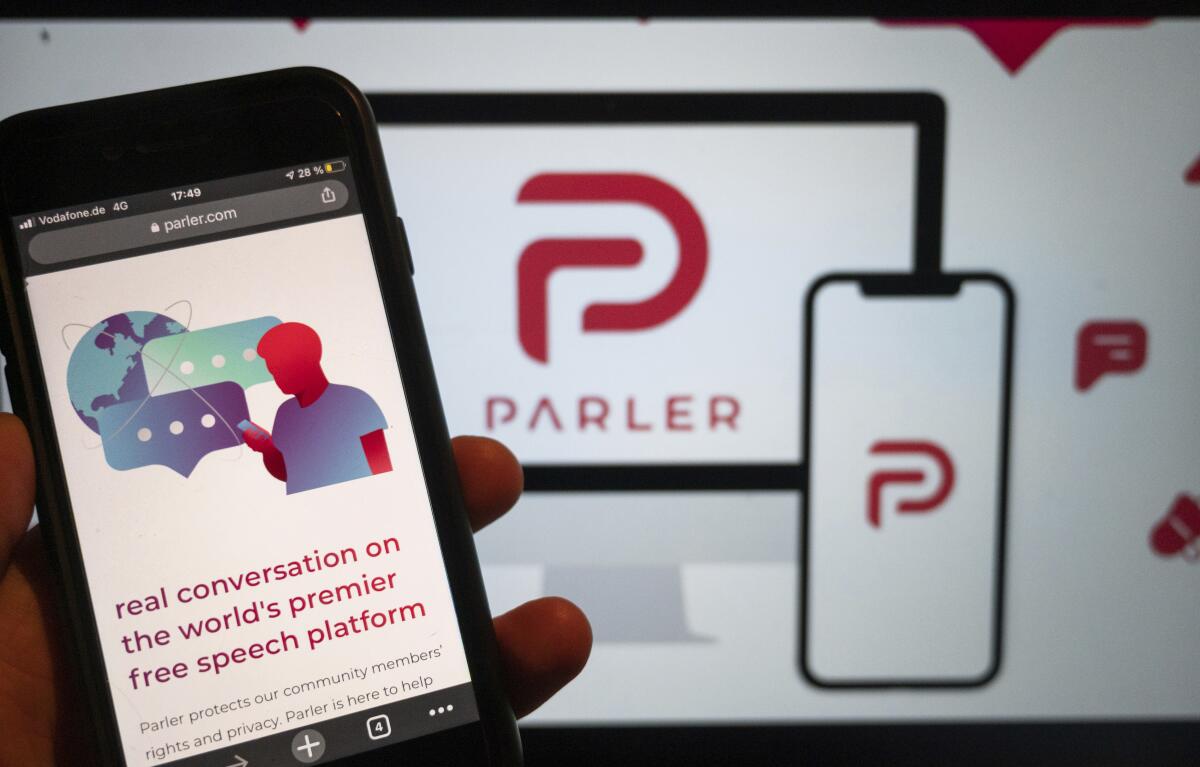 The social media platform Parler appears on a phone's screen.