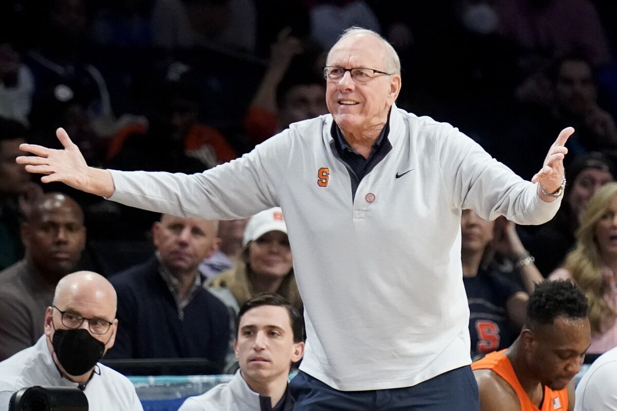 Syracuse head coach Jim Boeheim works the bench in the first half of an NCAA college basketball game against Duke during quarterfinals of the Atlantic Coast Conference men's tournament, Thursday, March 10, 2022, in New York. (AP Photo/John Minchillo)