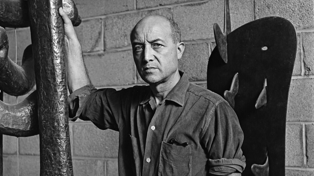 Sculptor Isamu Noguchi photographed in his Long Island, N.Y., studio in March 1966.