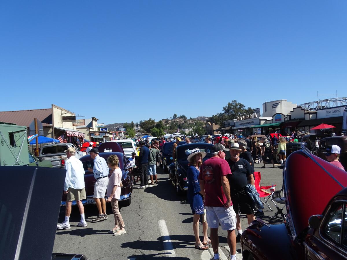 Hundreds of cars and even more spectators flood the closed area of Main Street in the 2021 AutoFest.