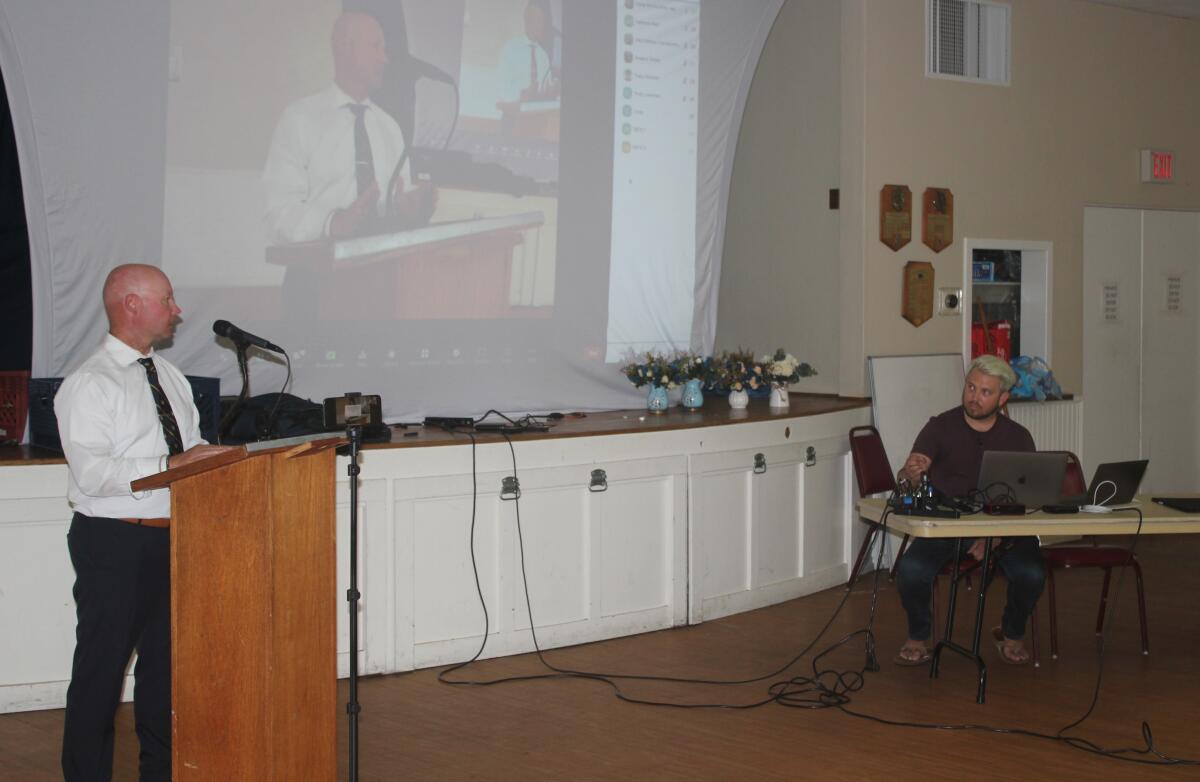 San Diego police Community Relations Officer David Surwilo (left) and OBTC President Corey Bruins