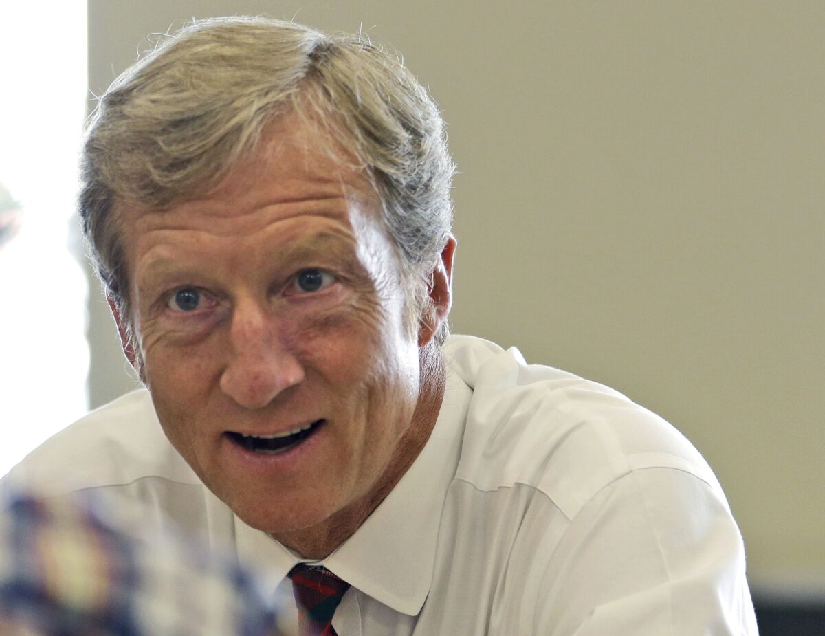San Francisco billionaire Tom Steyer, above, has put tens of millions of dollars into his run for the Democratic presidential nomination, but Michael Bloomberg is outspending him.
