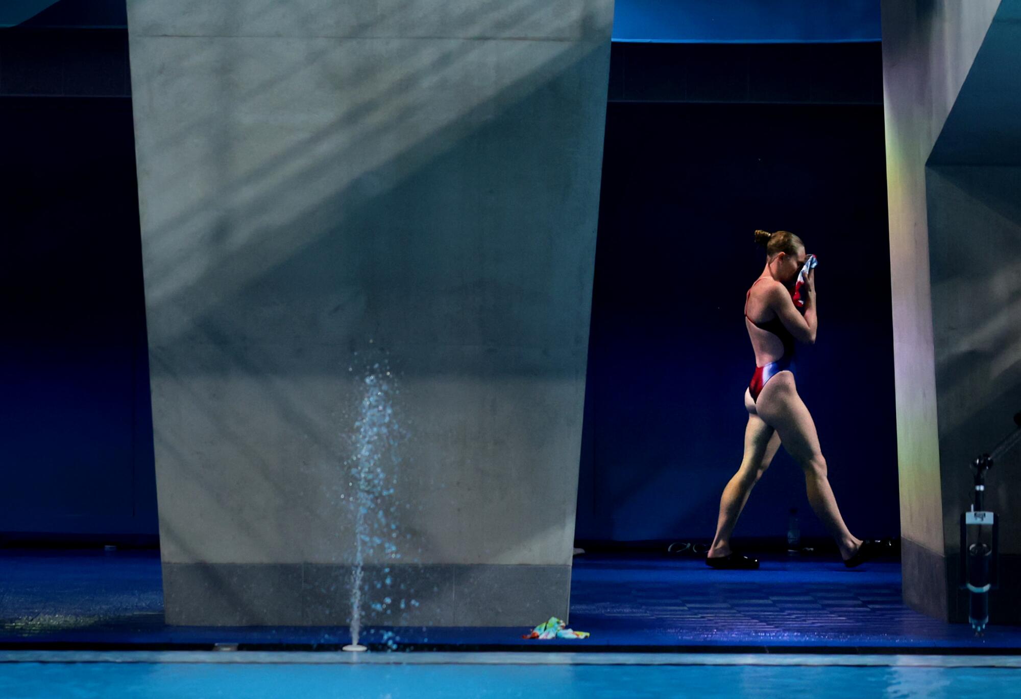 Divers warm-up in the women's 10 meter platform preliminaries at the 2024 Paris