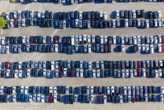 Aerial view of various parked cars