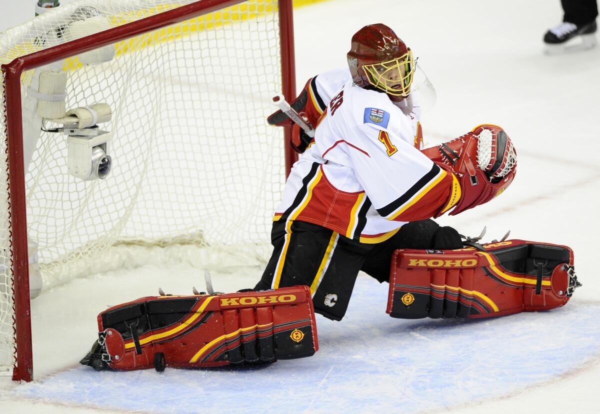 Calgary Flames goalie Jonas Hiller stops the puck against the Washington Capitals on Nov. 4.