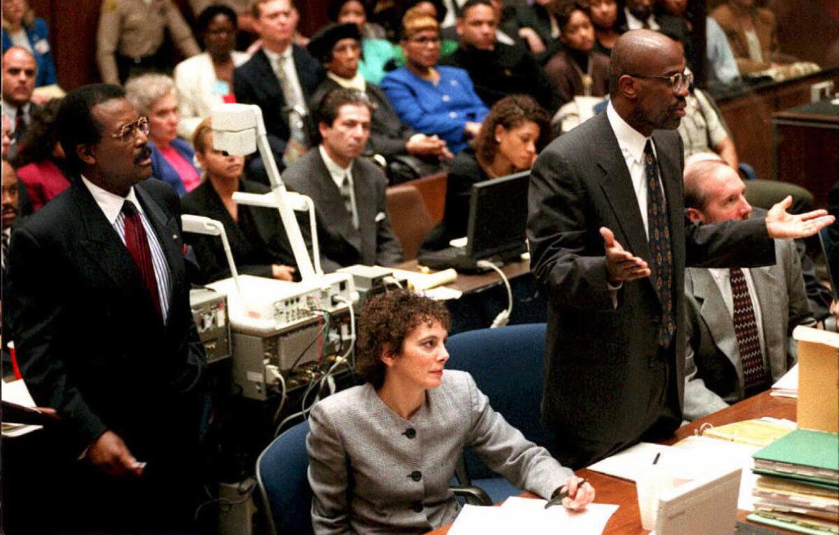 Johnnie Cochran, left, Marcia Clark and Christopher Darden during opening arguments. (Pool Photo)