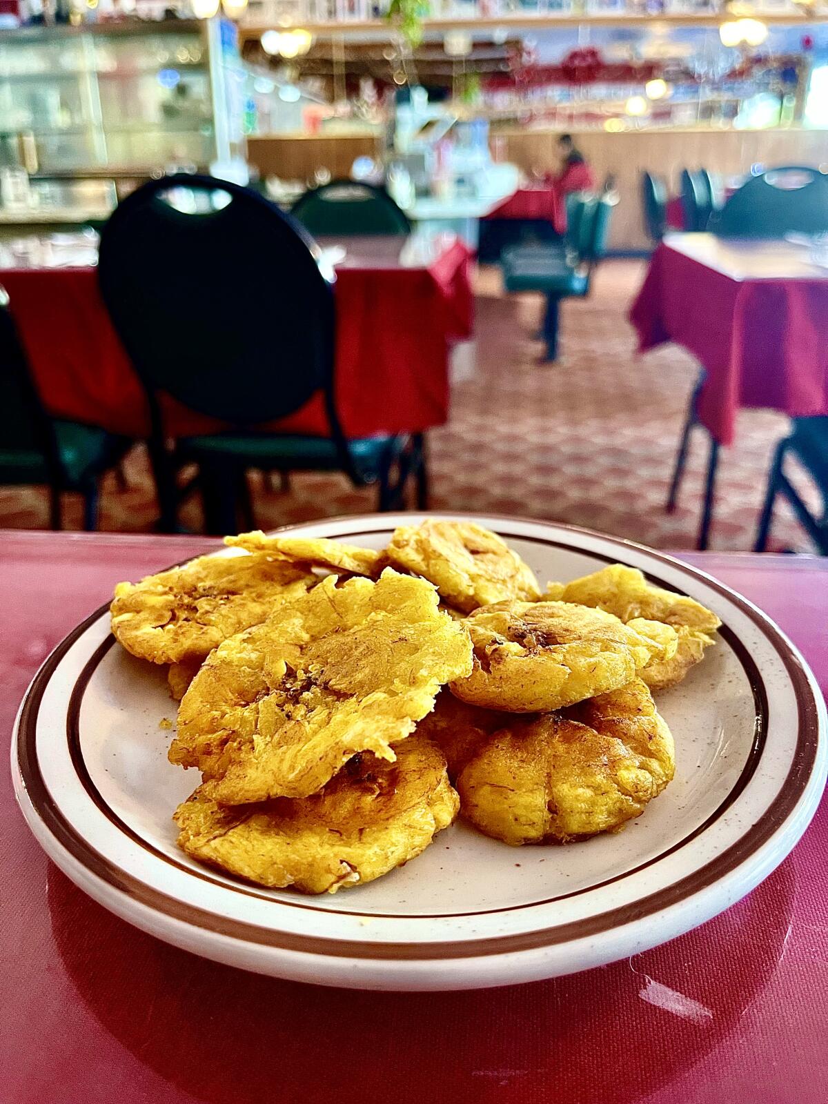 Tostones, fried green plantains, at El Colmao in Los Angeles.