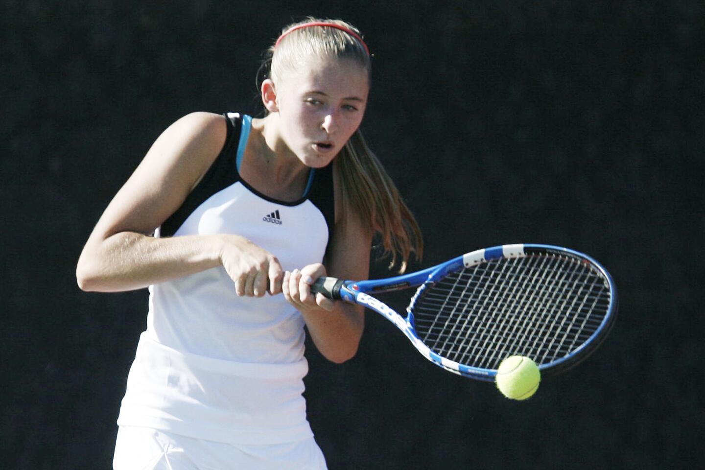 La Canada's Emily Swanson hits the ball during a match against CV at La Canada High School on Wednesday, September 19, 2012.