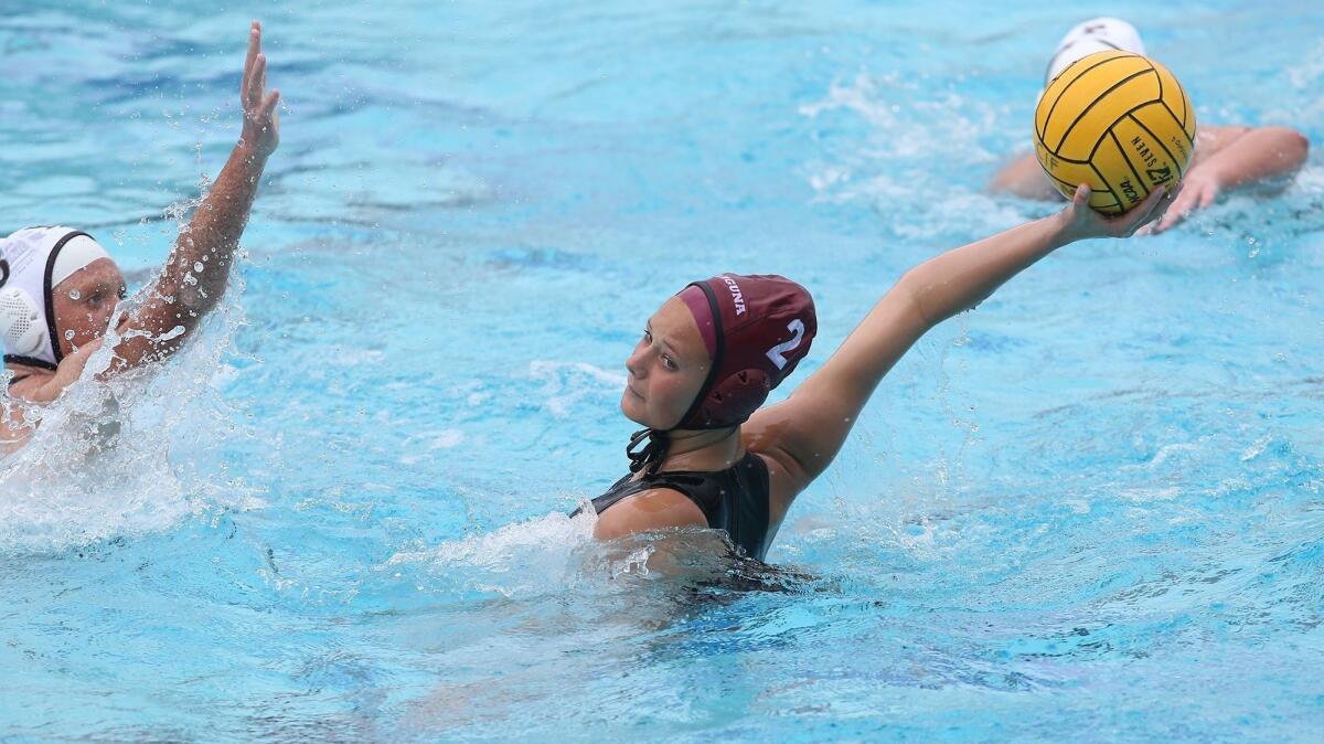 Laguna Beach High's Morgan Van Alphen, pictured taking a shot against San Diego Point Loma on March 2, helped the Breakers beat Coronado 19-5 in a nonleague match on Wednesday.