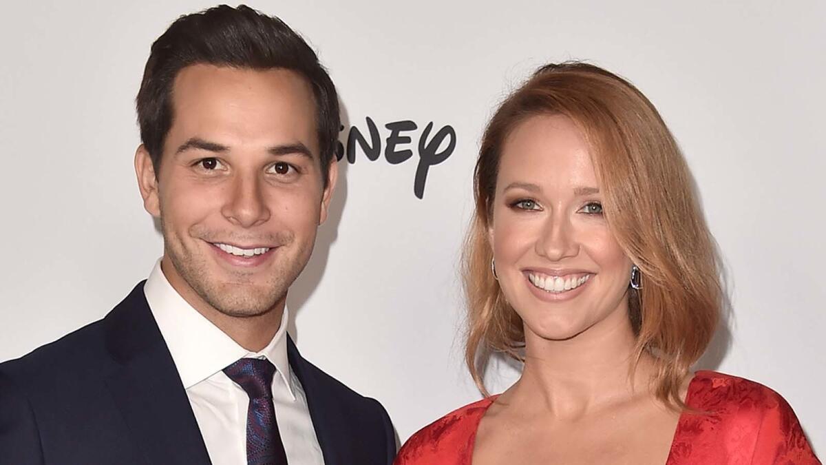 Skylar Astin, left, and Anna Camp in October 2018.